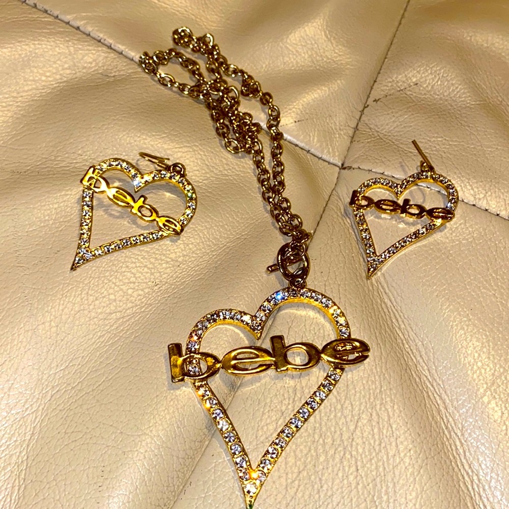 Bebe necklace and earrings gold w/white rhinestones.